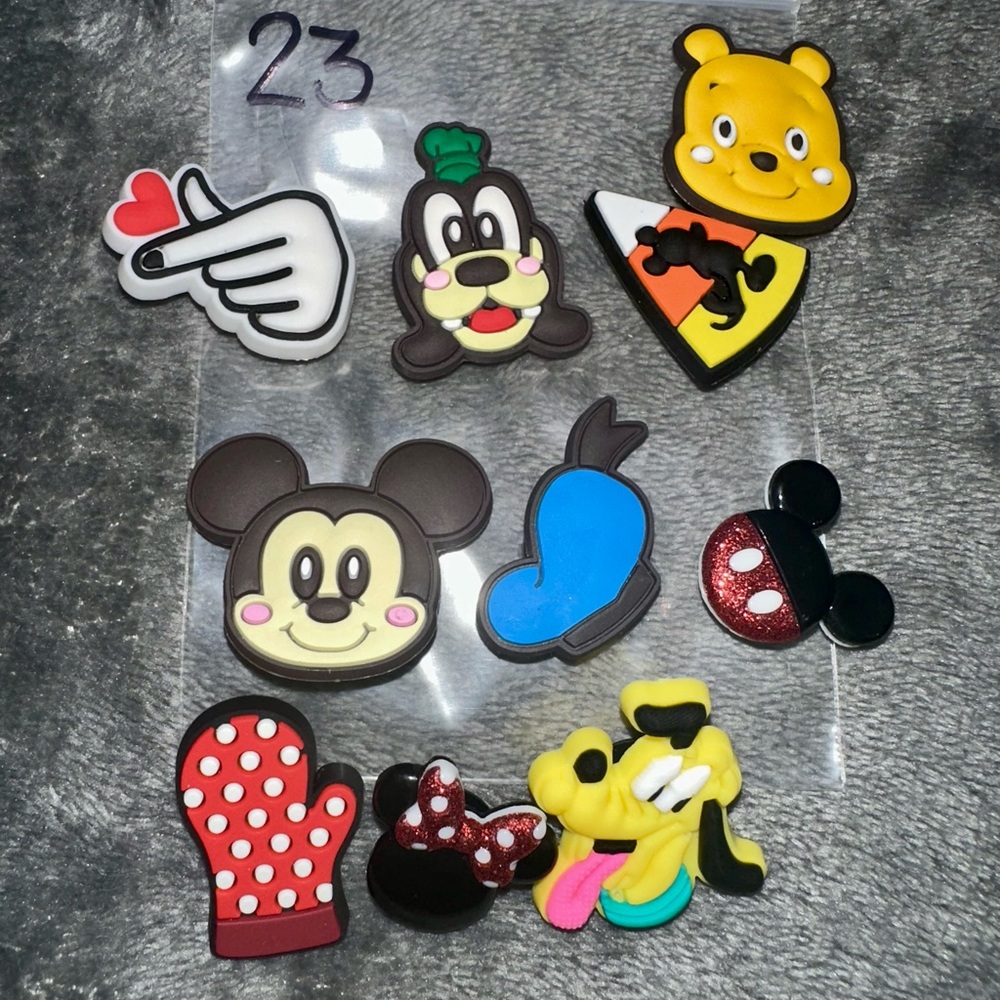 10 pice set random Disney croc charms NEW